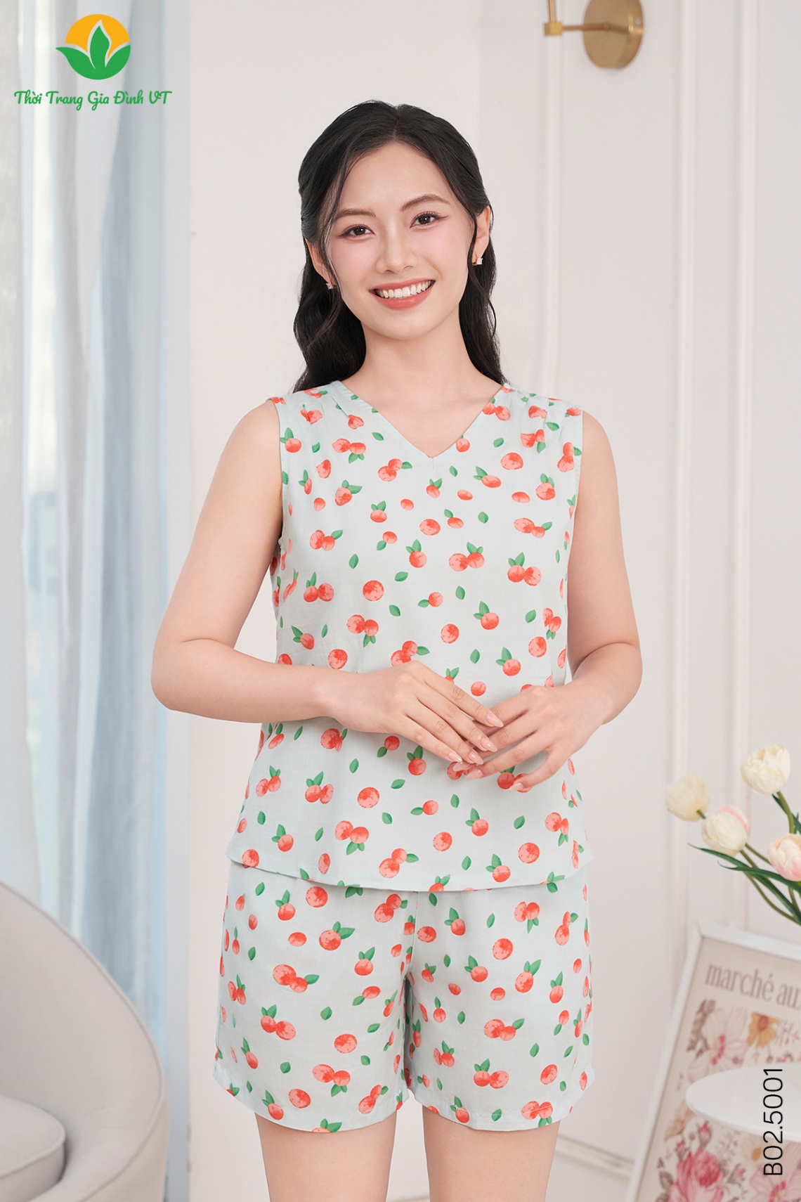 B02.5001. Bộ lanh nữ quần đùi áo sát nách xếp ly vai