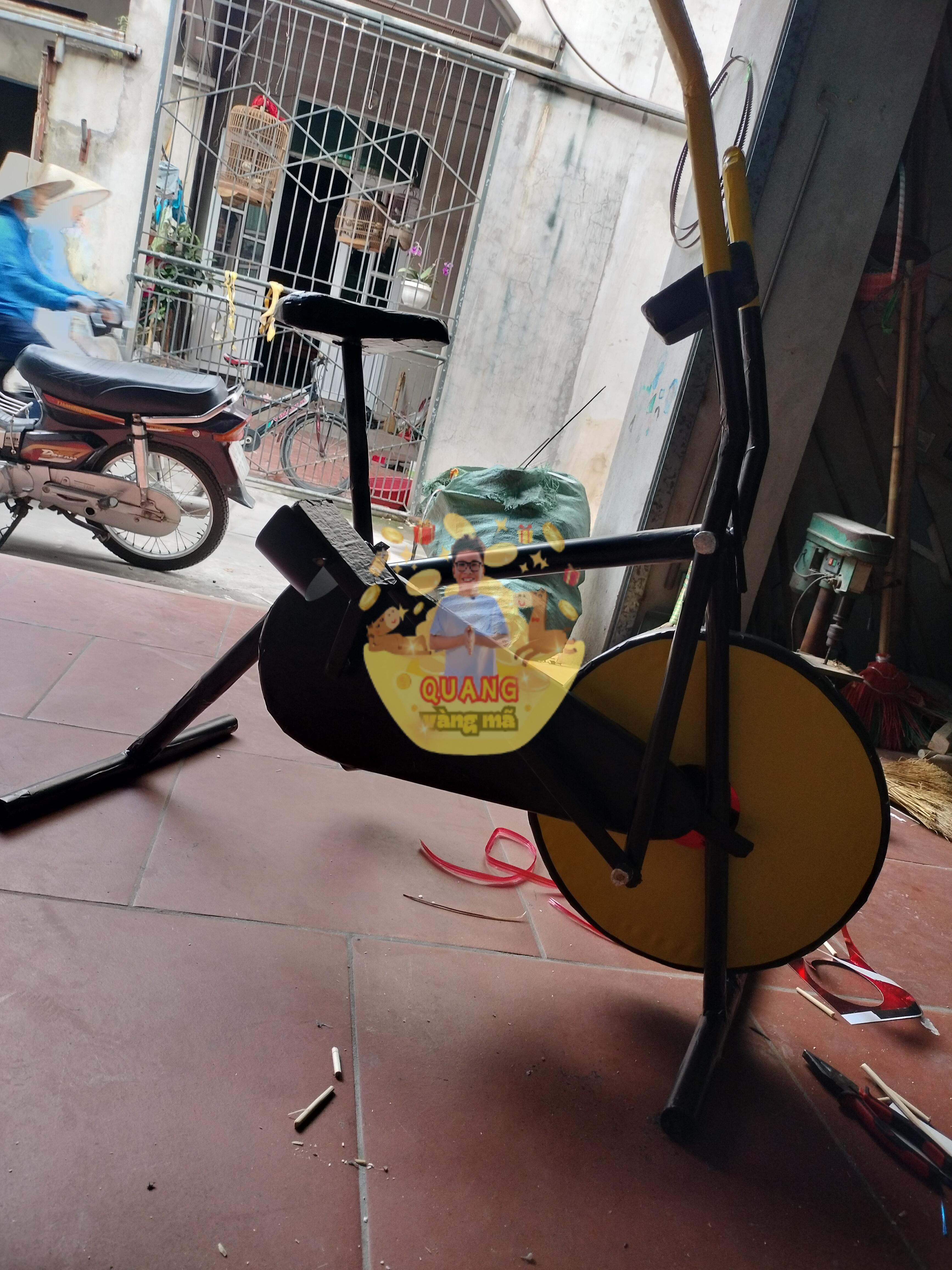 Máy đạp xe thể dục màu vàng đen