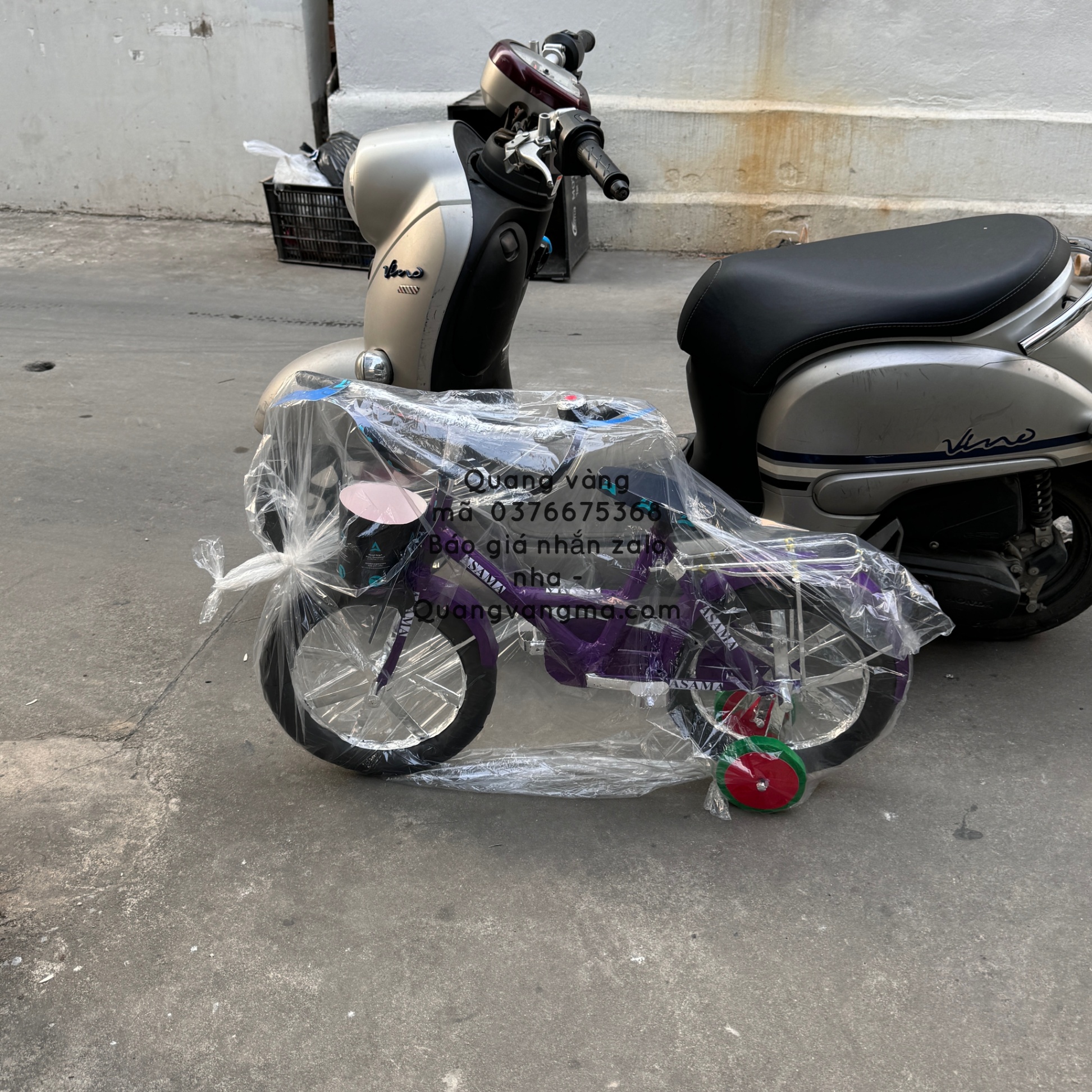 xe đạp ba bánh tím