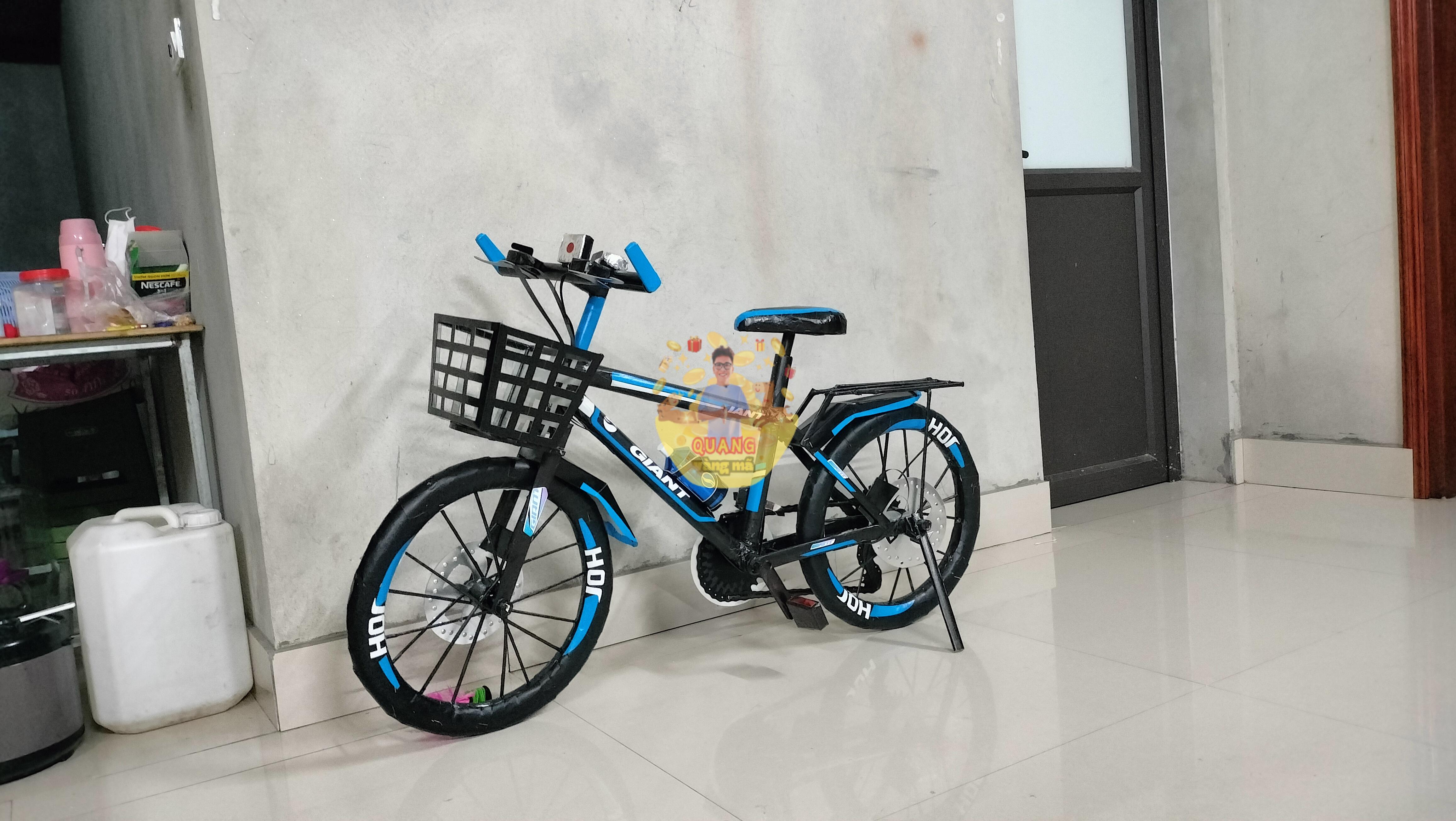 xe đạp gain đen xanh bé trai