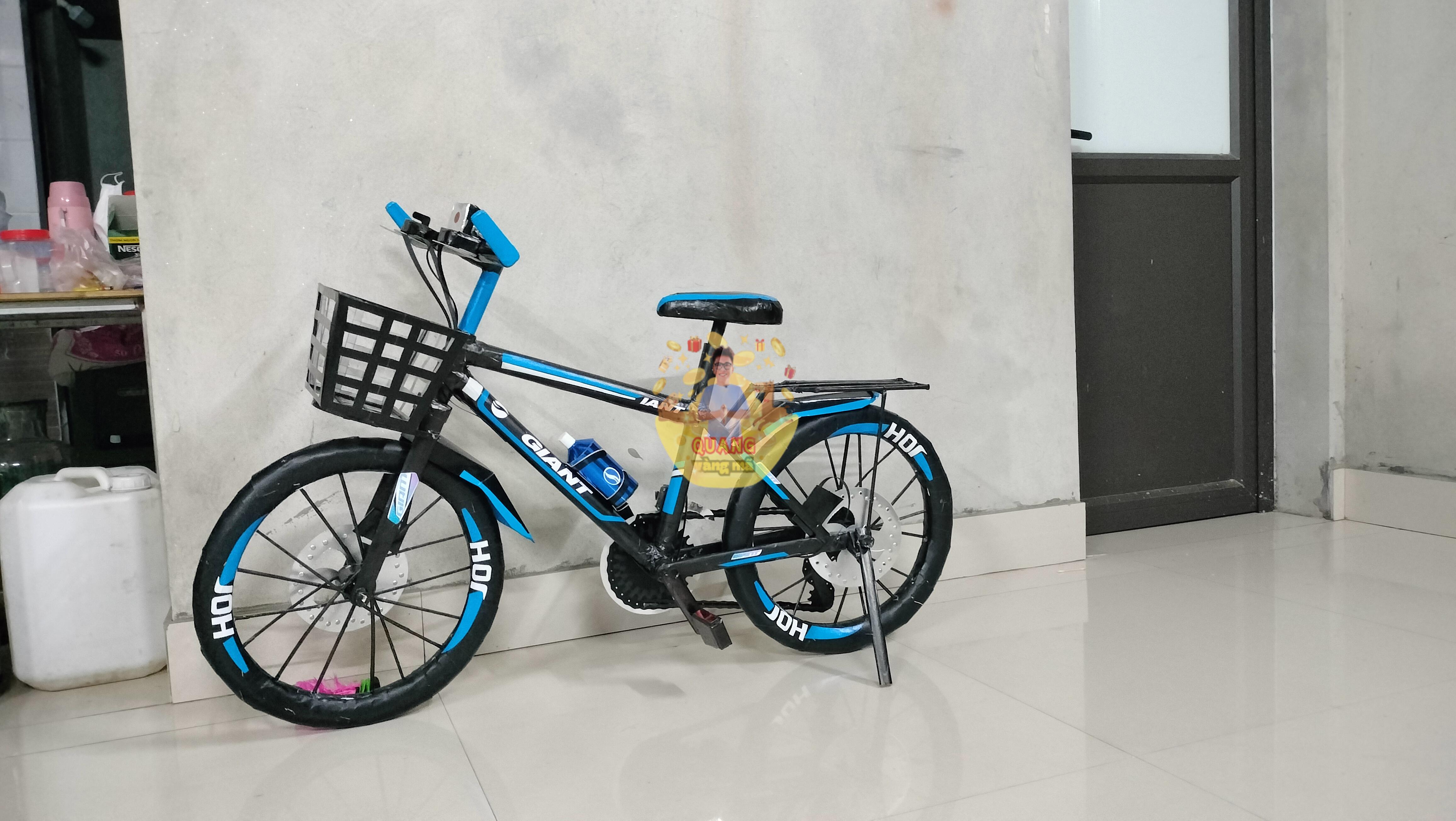 xe đạp gain đen xanh bé trai