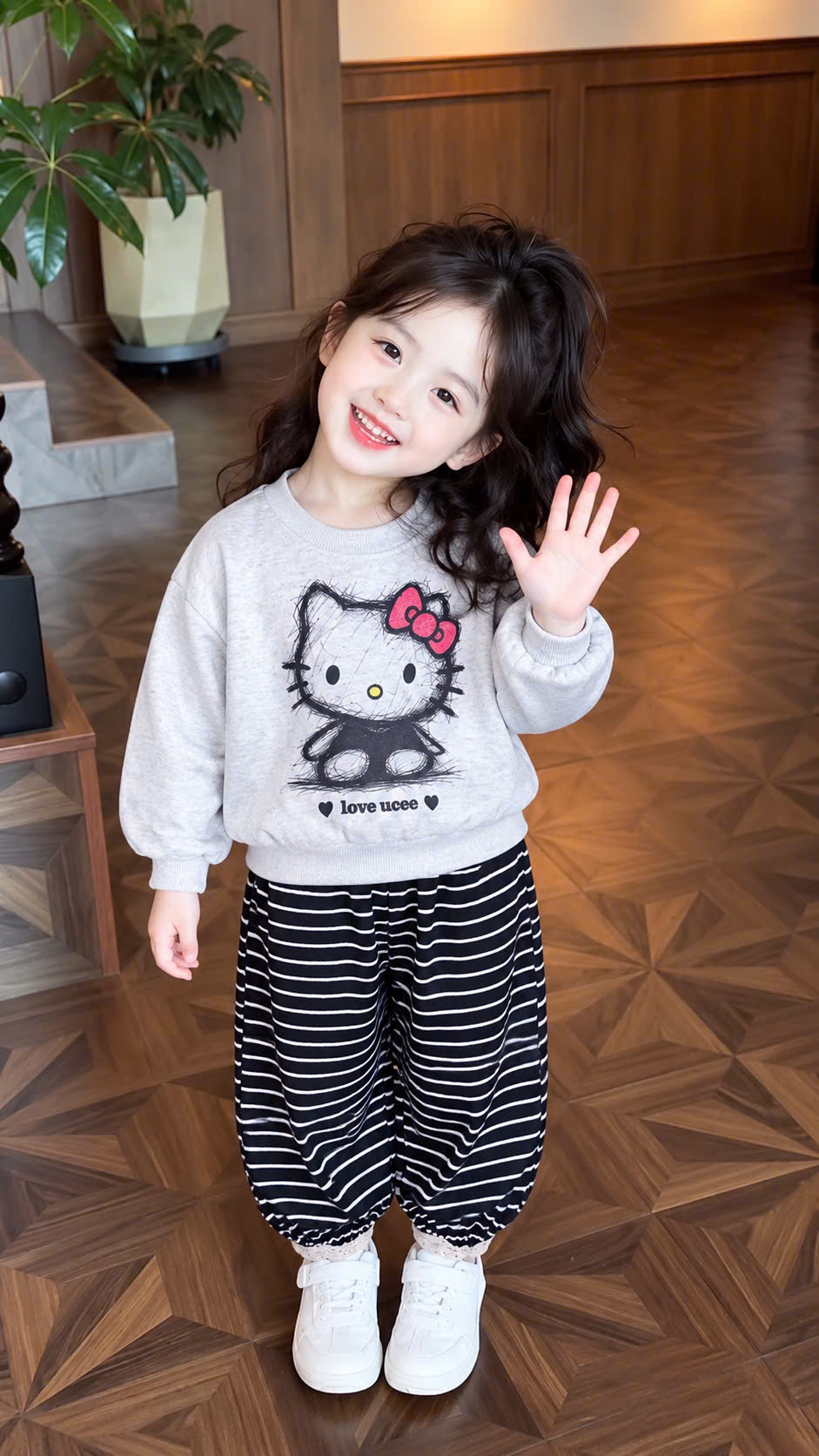 G125 - BỘ BÉ GÁI HAIDA XÁM KITTY QUẦN LEN KẺ ĐEN