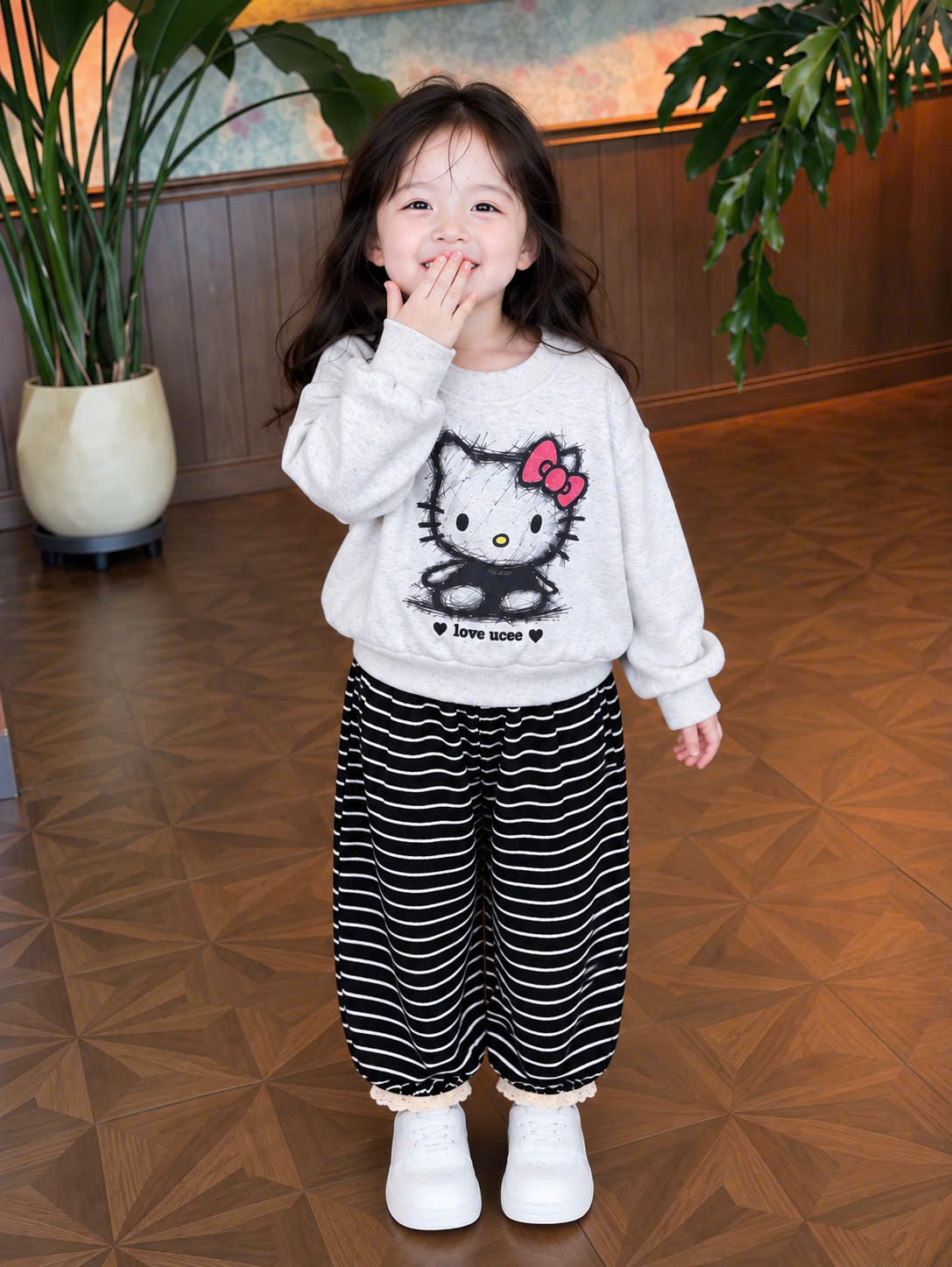 G125 - BỘ BÉ GÁI HAIDA XÁM KITTY QUẦN LEN KẺ ĐEN