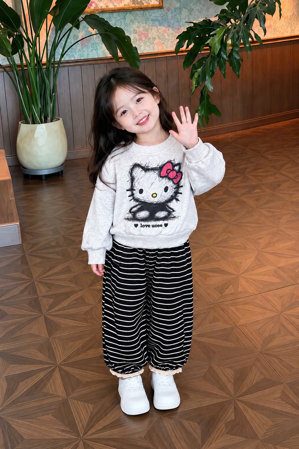 G125 - BỘ BÉ GÁI HAIDA XÁM KITTY QUẦN LEN KẺ ĐEN