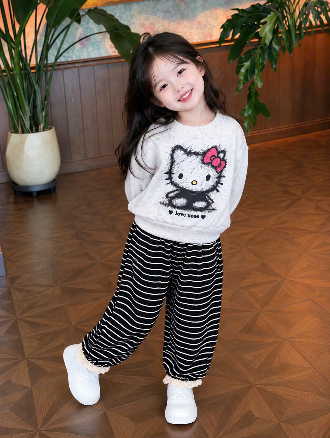 G125 - BỘ BÉ GÁI HAIDA XÁM KITTY QUẦN LEN KẺ ĐEN