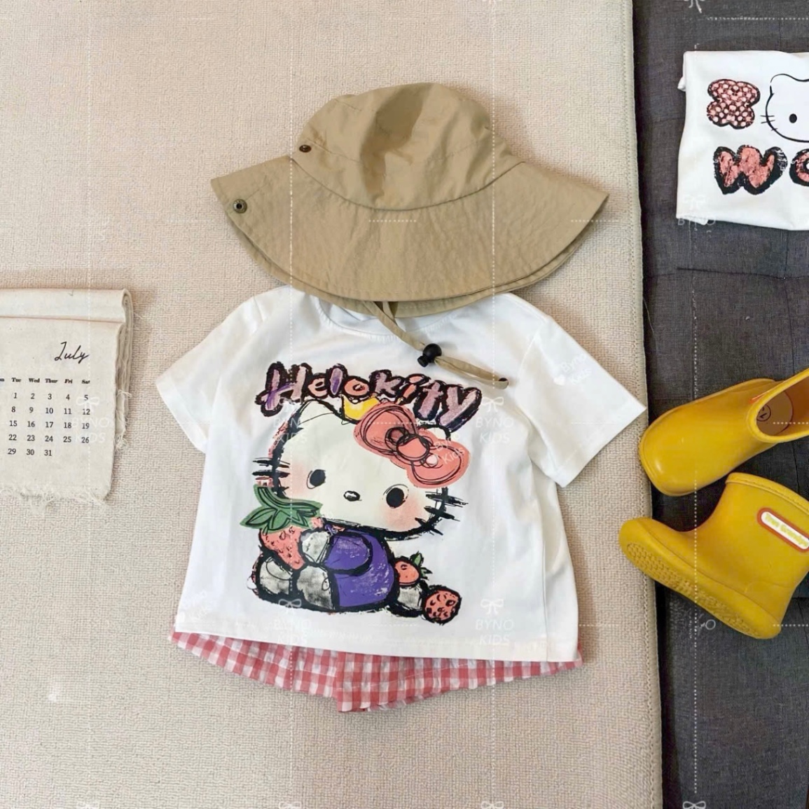 G639 - BỘ ĐÙI BÉ GÁI ÁO TRẮNG KITTY QUẦN KẺ HỒNG