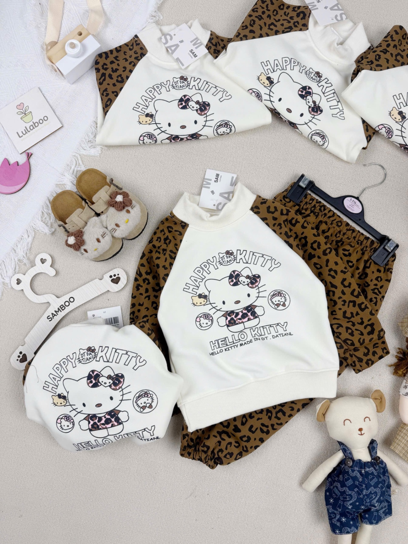 G863 - BỘ BÉ GÁI NỈ HAIDA BE KITTY TAY BÁO NÂU
