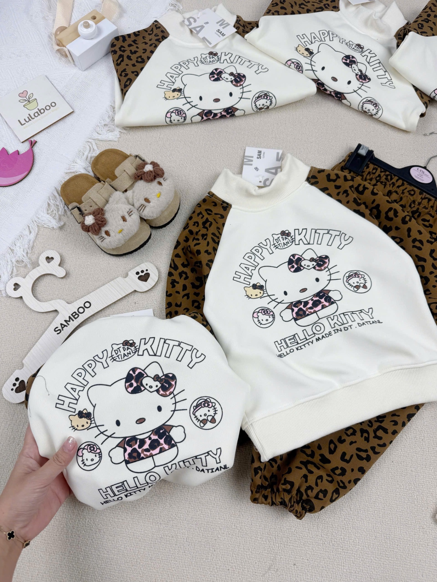 G863 - BỘ BÉ GÁI NỈ HAIDA BE KITTY TAY BÁO NÂU