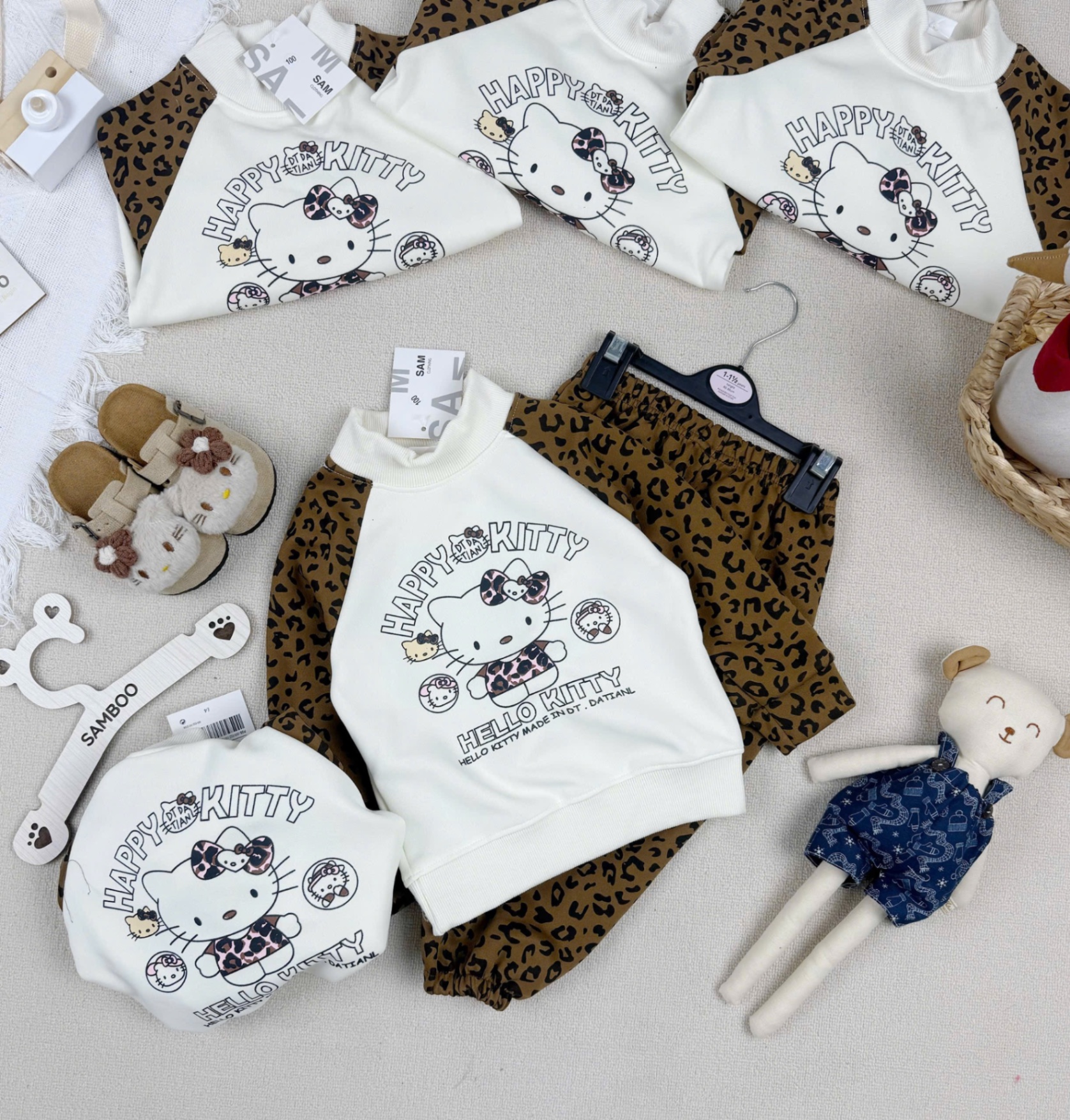 G863 - BỘ BÉ GÁI NỈ HAIDA BE KITTY TAY BÁO NÂU