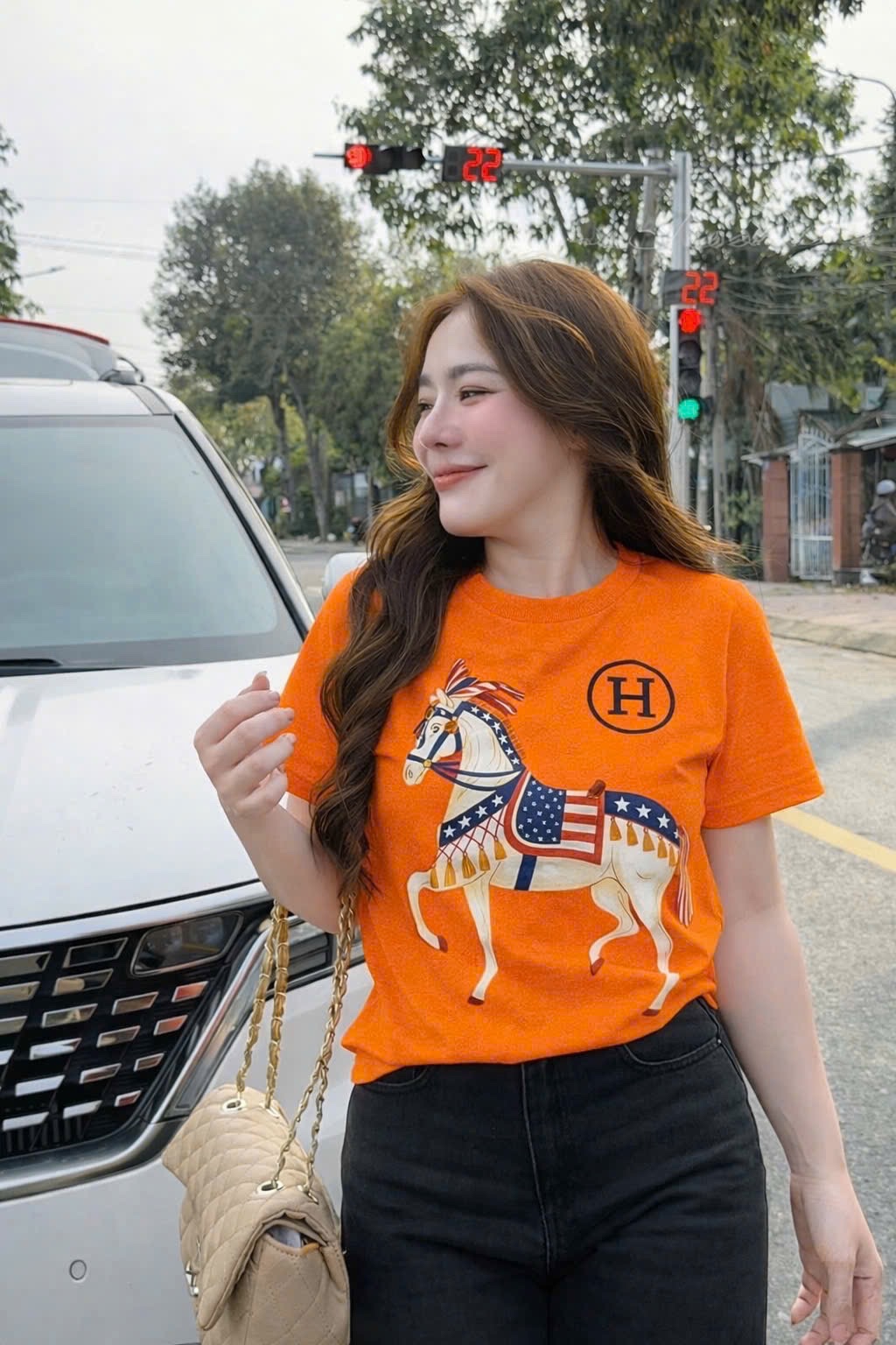 ANU343 - ÁO PHÔNG NỮ MÀU CAM NGỰA CHỮ H