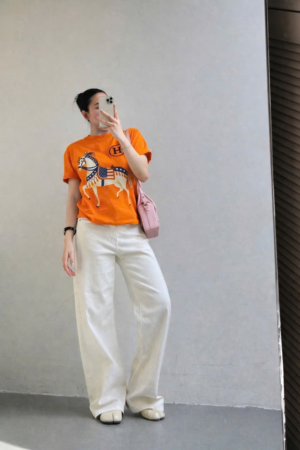 ANU343 - ÁO PHÔNG NỮ MÀU CAM NGỰA CHỮ H