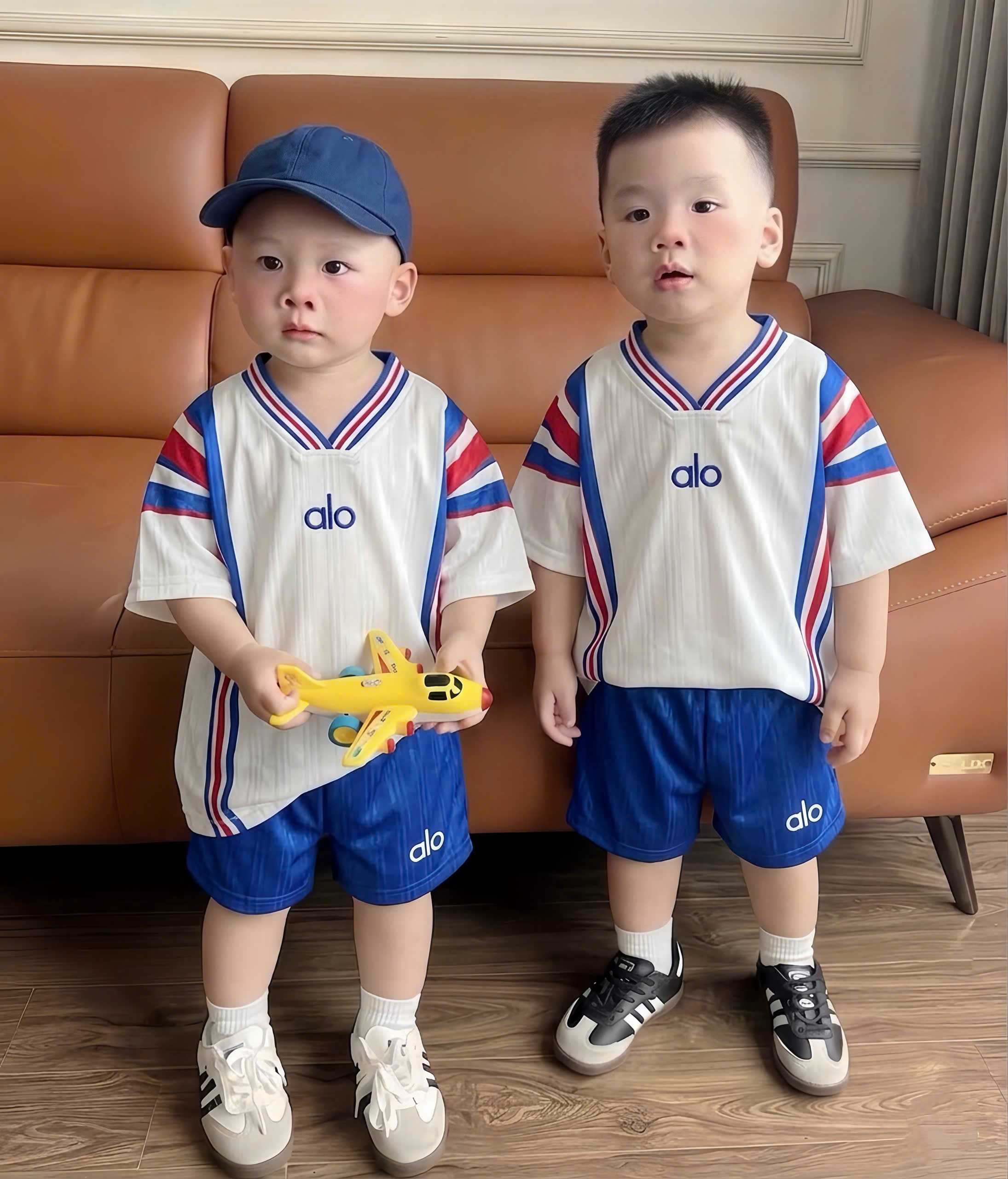 T312 - BỘ ĐÙI BÉ TRAI THỂ THAO XANH PHỐI TRẮNG alo