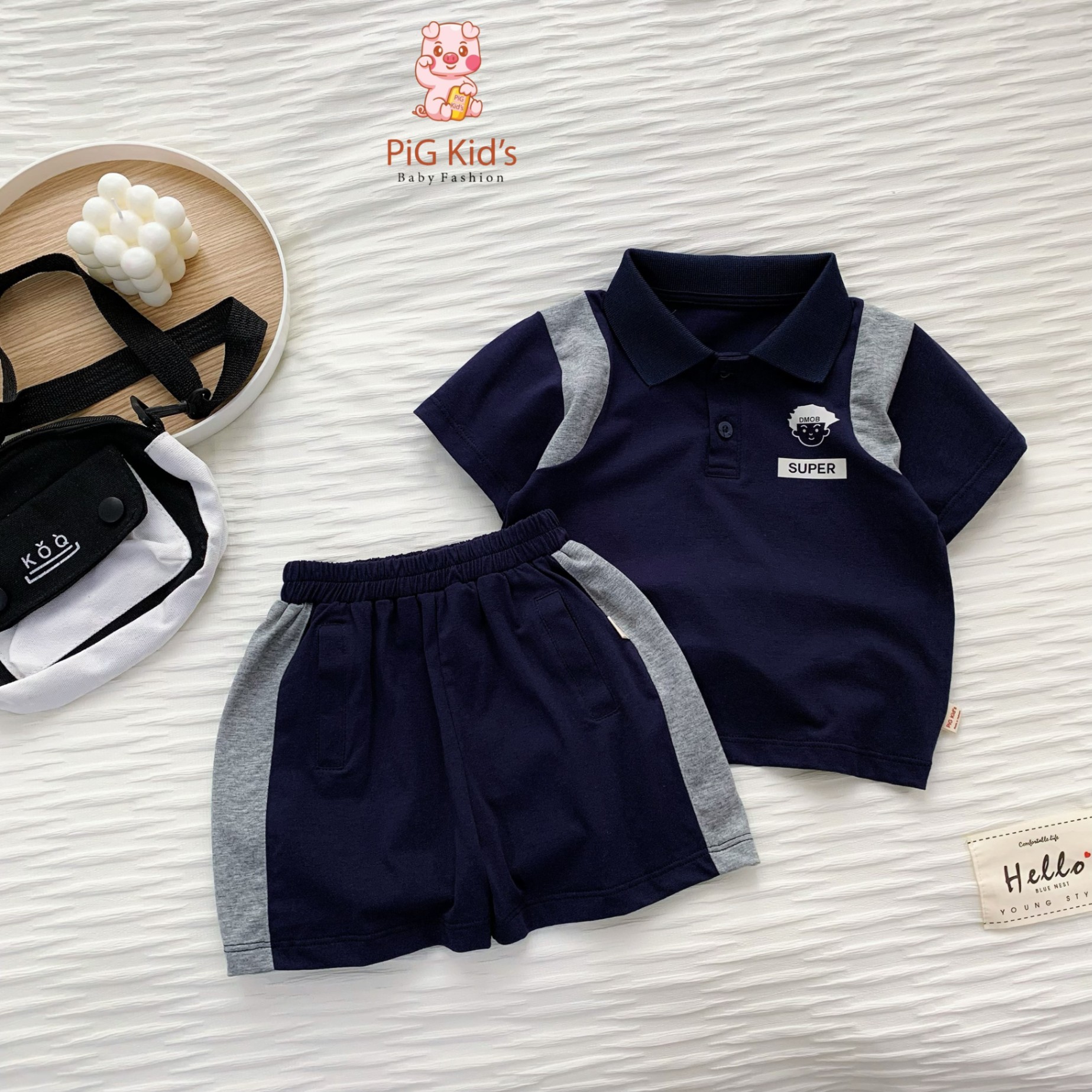 Bộ polo cotton cộc tay phối màu họa tiết in xinh xắn Pig Kid cho bé