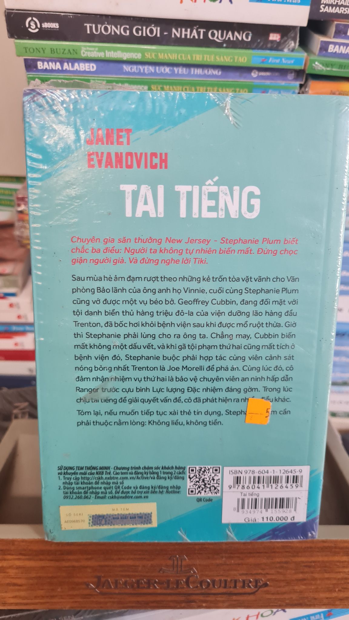 Tai tiếng - Janet Evanovich [2001] SÁCH VĂN HỌC-Sách lưu kho còn seal có chấm ố cạnh