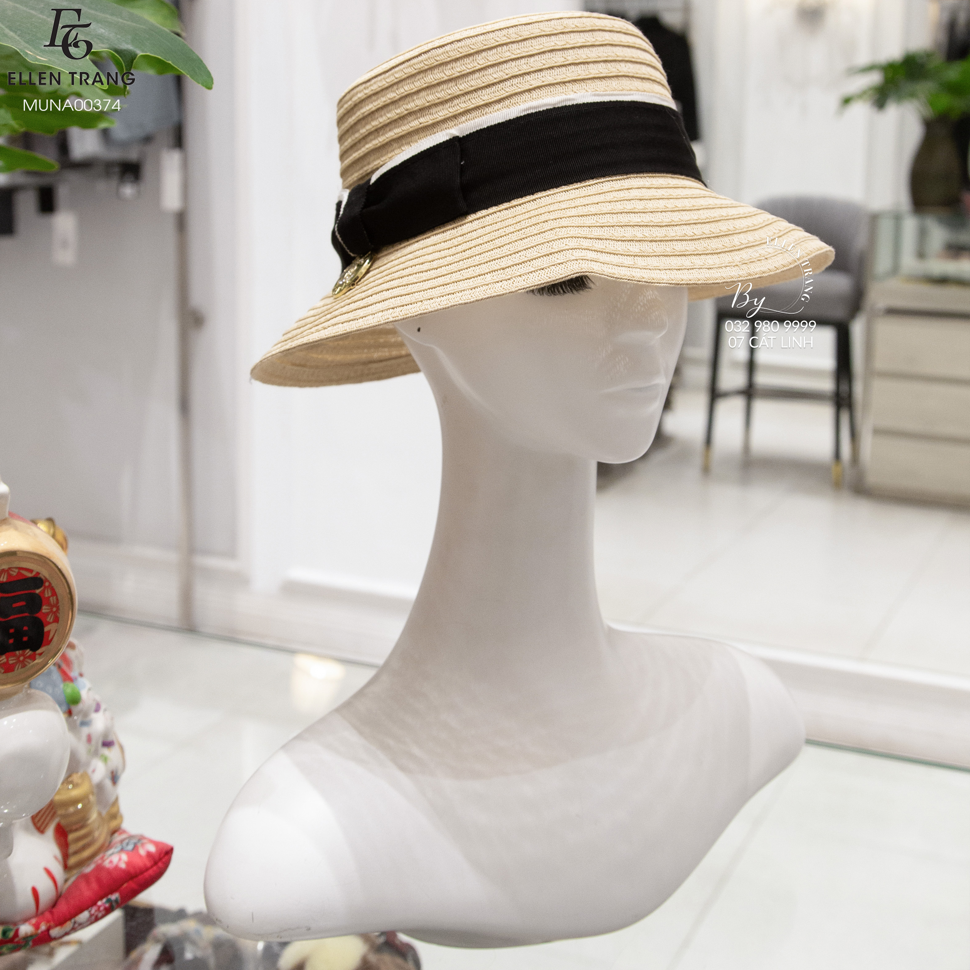 MŨ NÂU VIỀN ĐEN TRẮNG LOGO VÀNG CHANEL