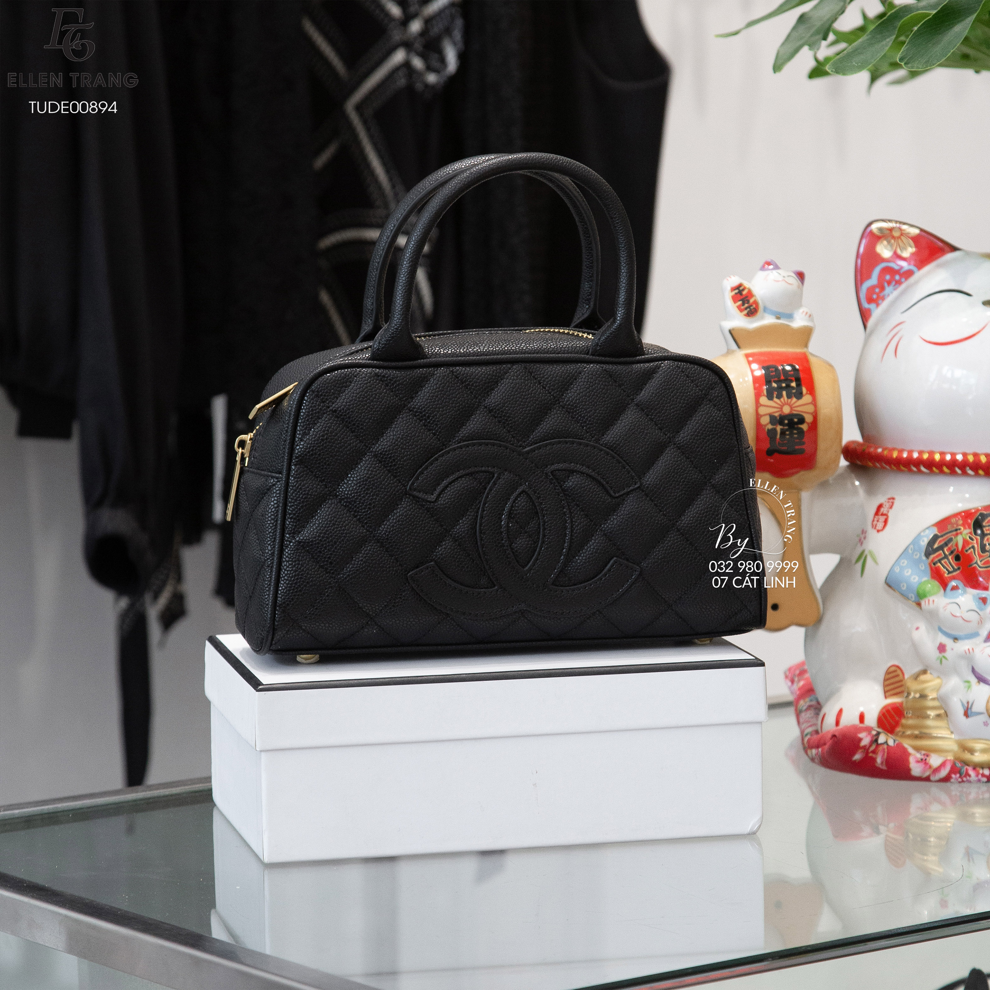 TÚI CHANEL ĐEN KHOÁ VÀNG CẦM TAY 25*15*7CM
