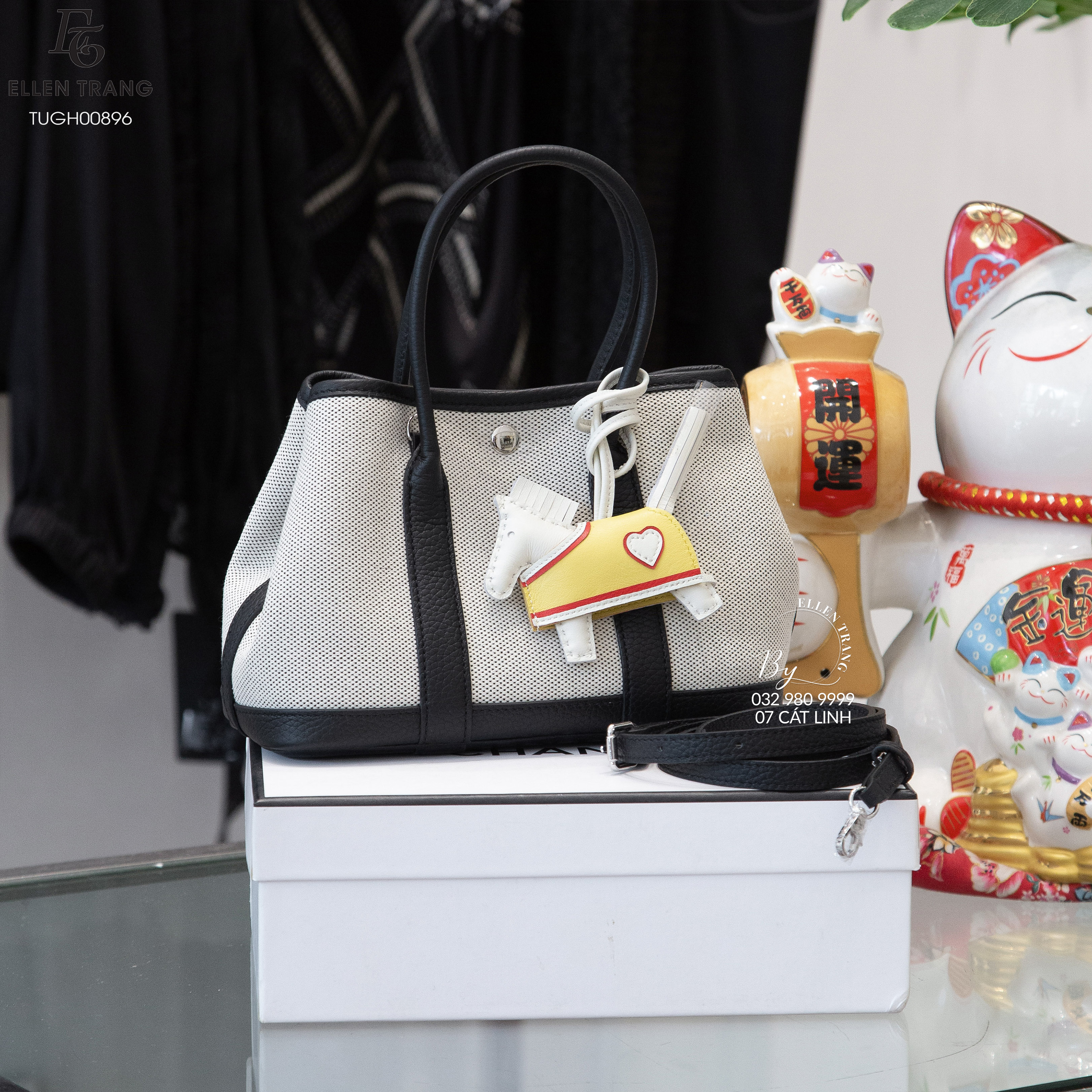 TÚI GHI VIỀN ĐEN MÓC KHOÁ NGỰA 22*15*10CM