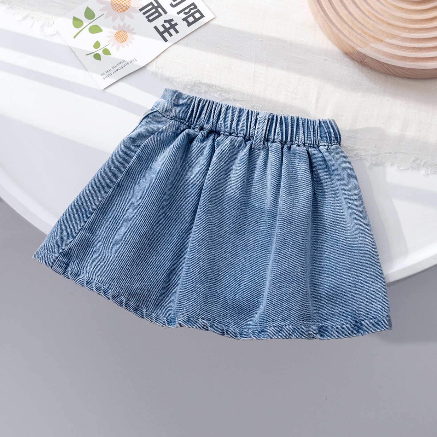 24HA113.06 - CHÂN VÁY BÒ XẾP LY BÉ GÁI