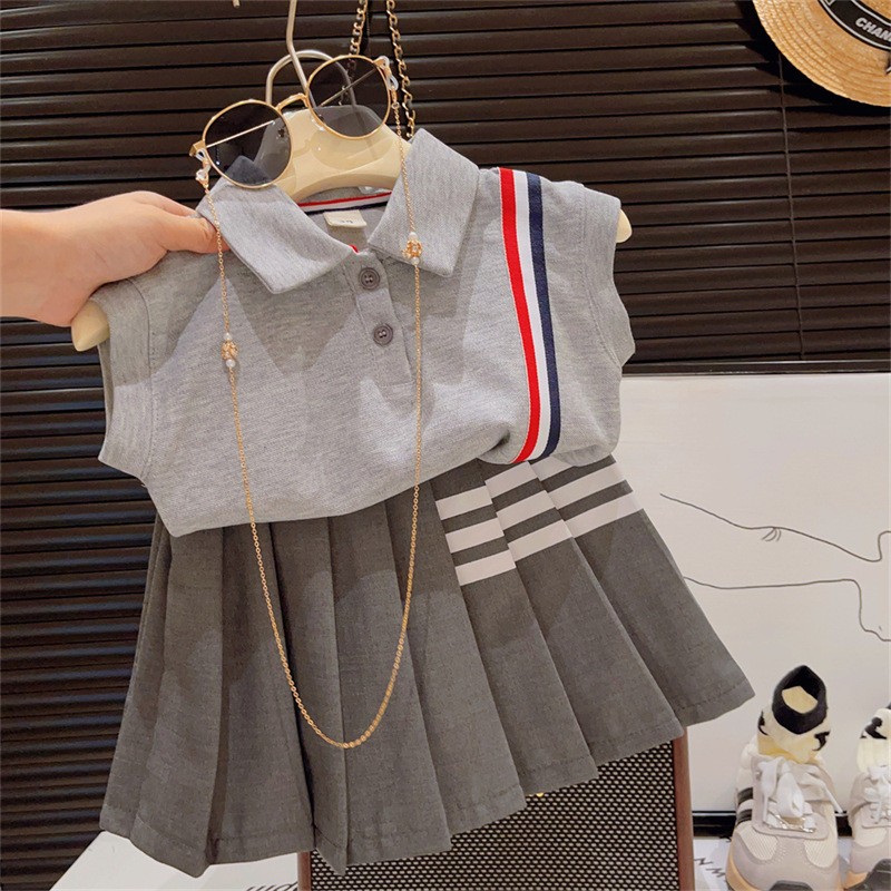 24HH213.13- SET ÁO POLO SÁT NÁCH MIX CHÂN VÁY XẾP LY CHO BÉ