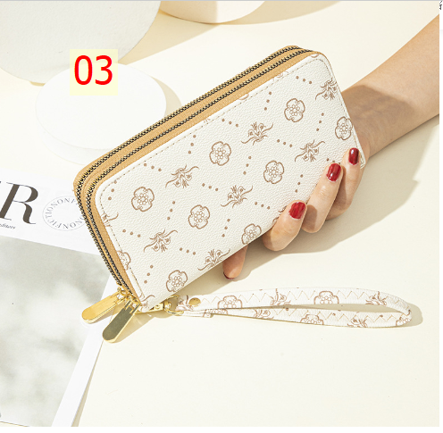 24HA216.23 - VÍ NỮ CẦM TAY MK