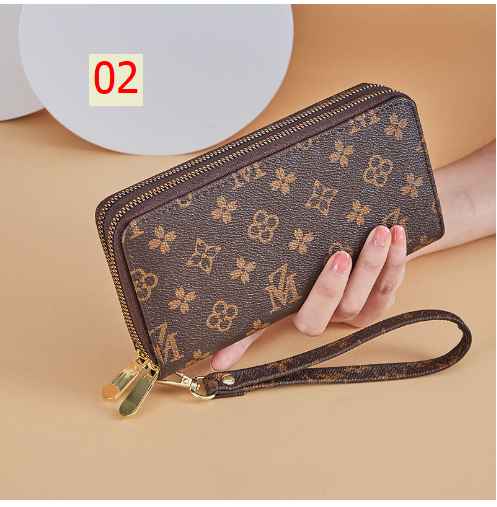 24HA216.23 - VÍ NỮ CẦM TAY MK