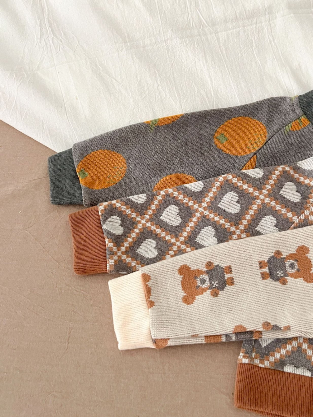 24HA267.24 - ÁO CARDIGAN LEN SIZE NHÍ CHO BÉ