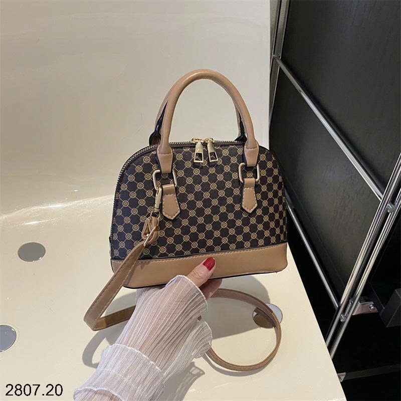 25HA2807.20 - TÚI XÁCH VỎ SÒ NỮ