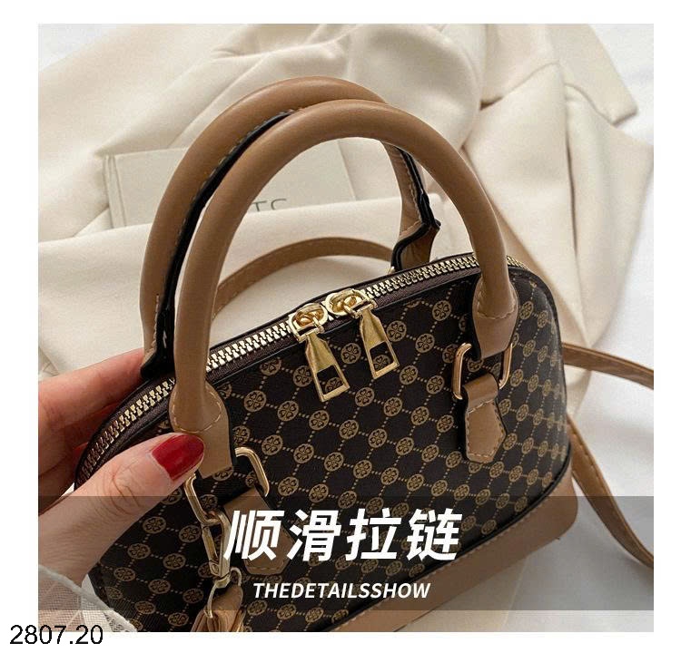 25HA2807.20 - TÚI XÁCH VỎ SÒ NỮ