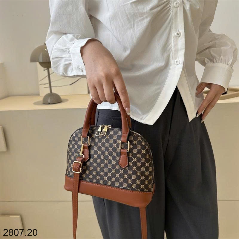 25HA2807.20 - TÚI XÁCH VỎ SÒ NỮ