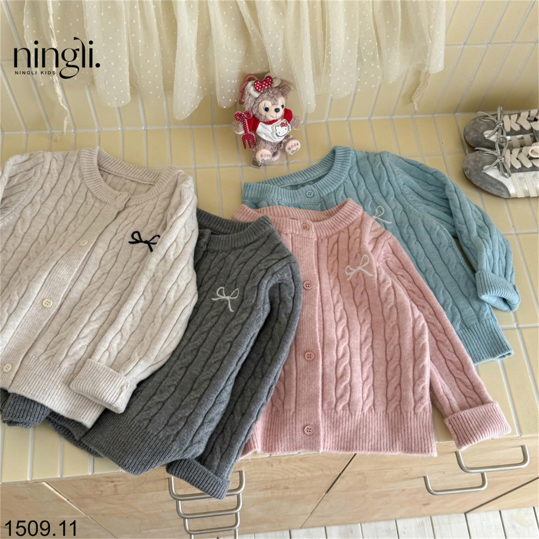 25HA1509.11 - ÁO CARDIGAN VĂN THỪNG HÌNH NƠ BÉ GÁI NINGLI