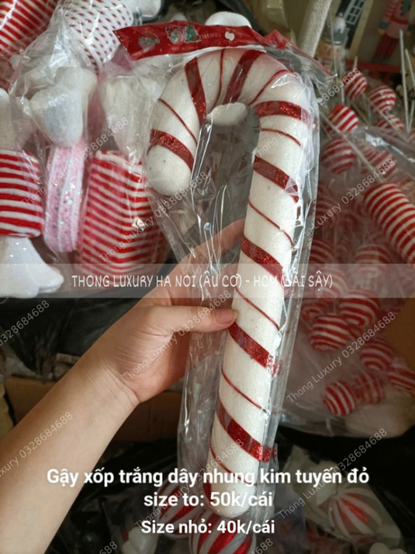 Gậy xốp trắng dây nhung kim tuyến đỏ