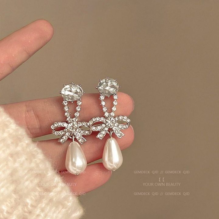 Bông tai đá thả nơ gn 1148