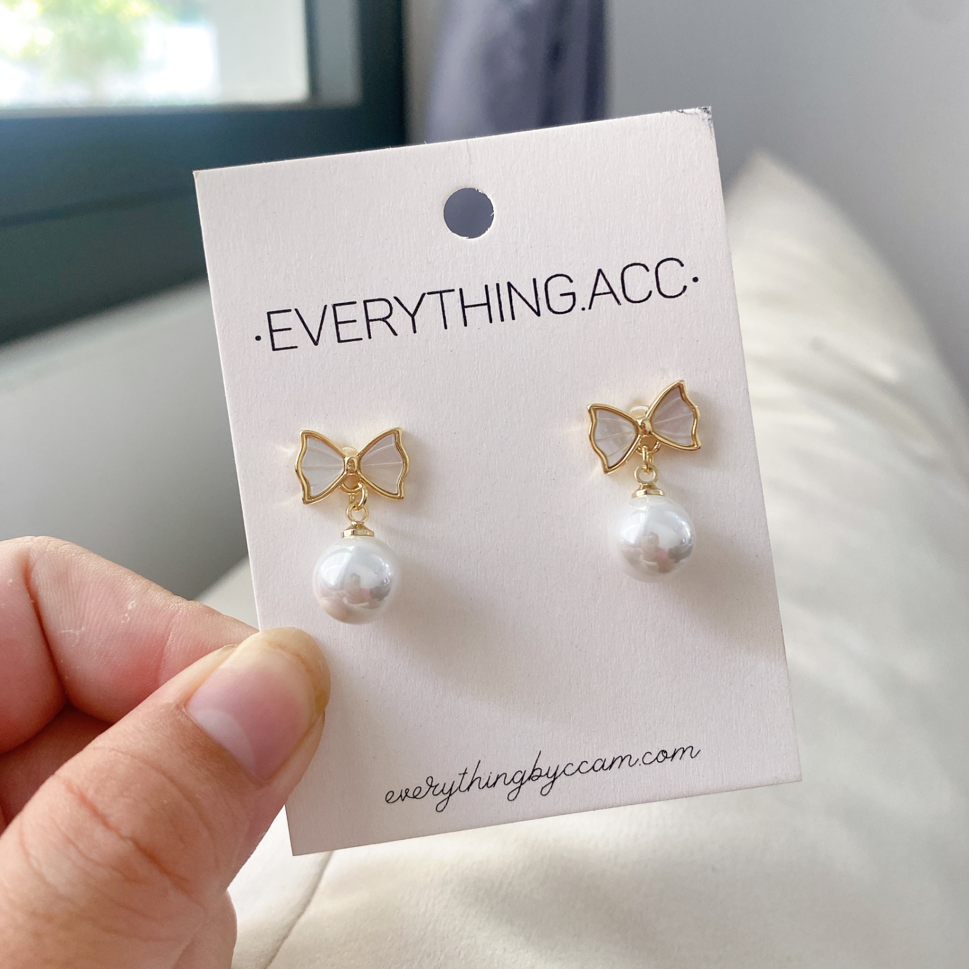 Bông tai nơ đá thả ngọc 1250