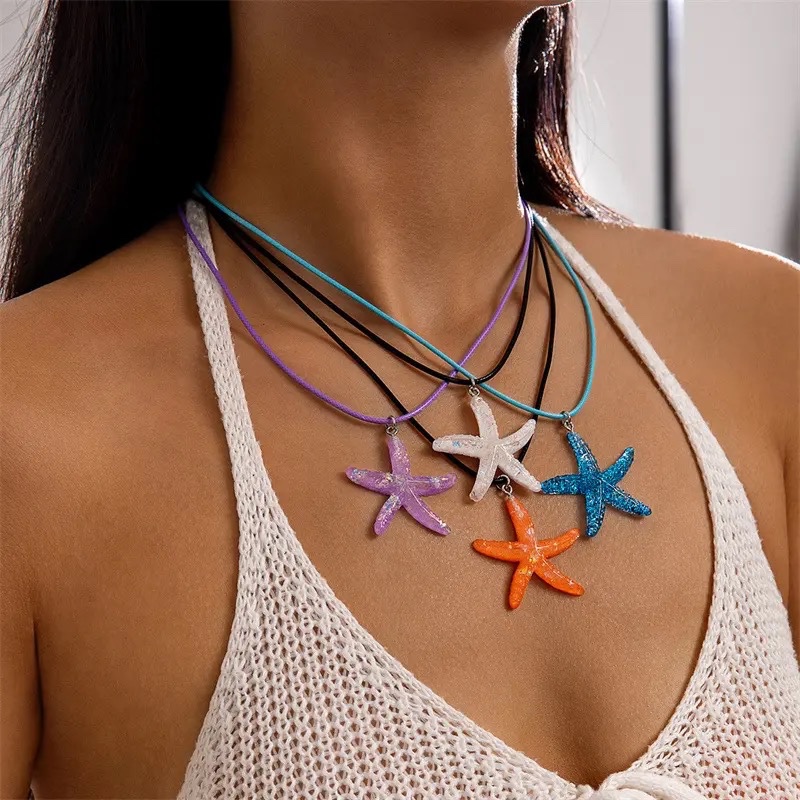 Vòng cổ dây đen charm sao biển nhựa 938