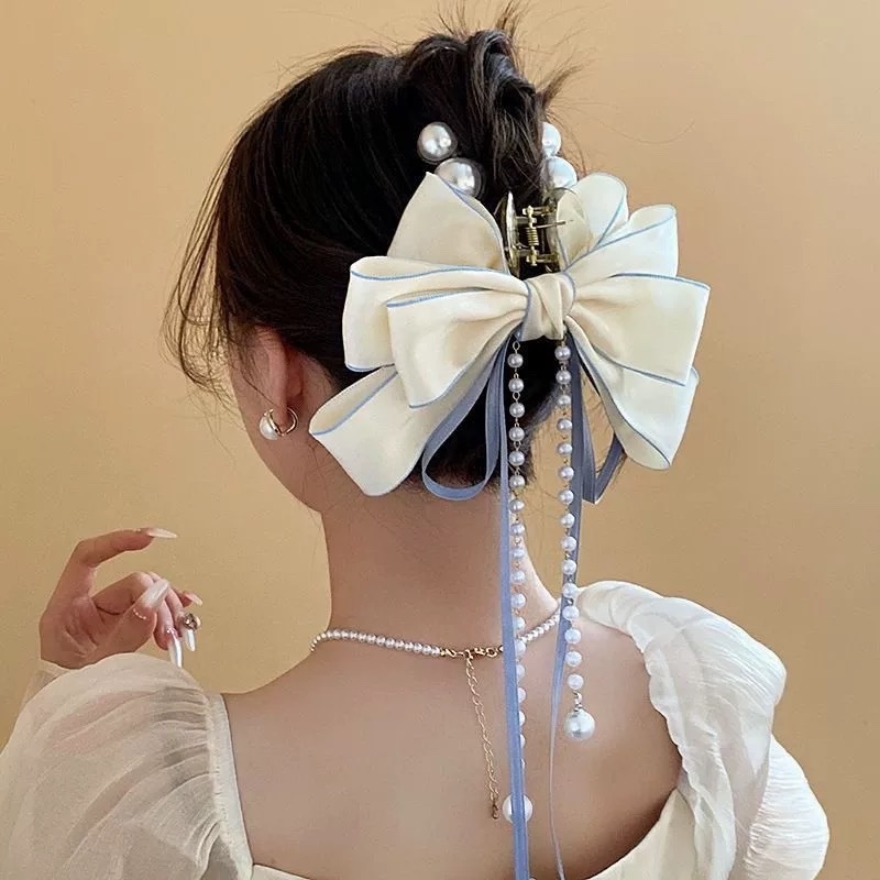 Gắp ngọc nơ trắng sau thả dây 4410