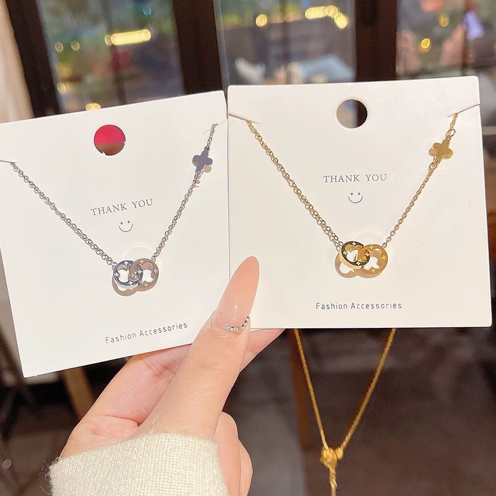 Vòng cổ titan mạ màu hoa tròn lồng 973