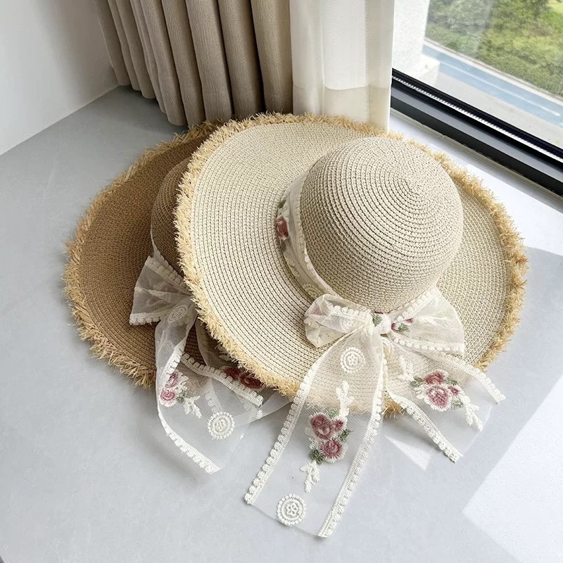 Mũ cói vành tua ren nơ hoa 102