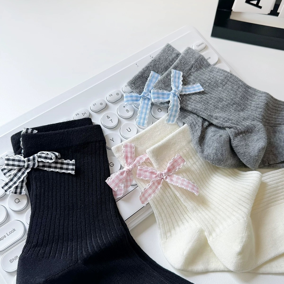 Tất cao cổ nơ caro 1016