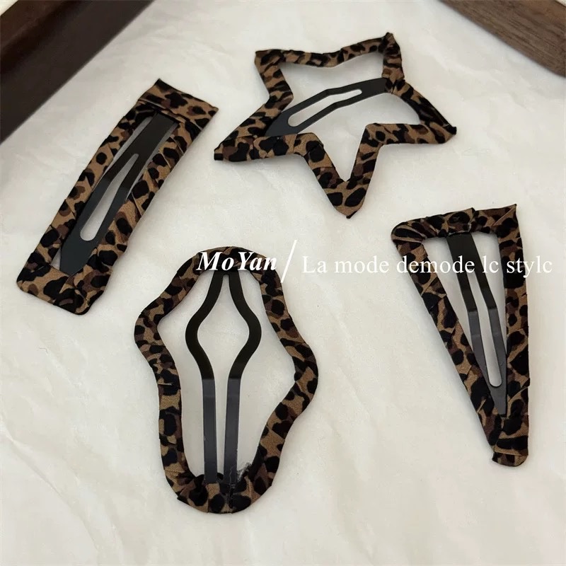 Kẹp tách da beo bọc vải 4603