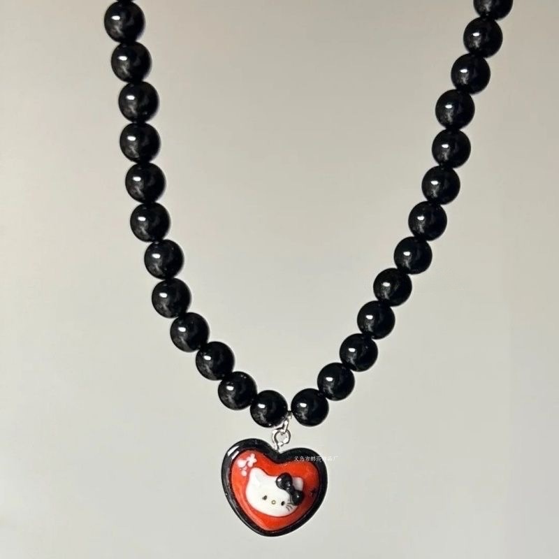 Vòng cổ hạt đen mặt tim hello kitty 984