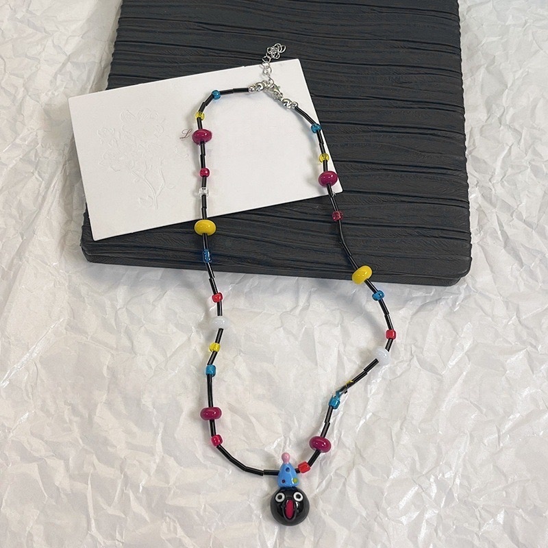 Vòng cổ dây hạt mặt hề đen 976