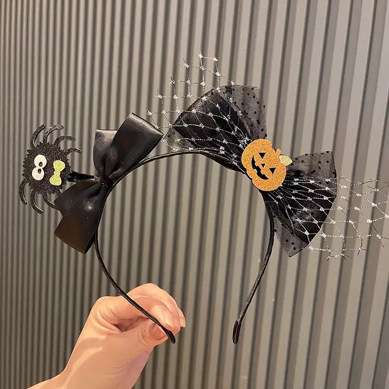 Cài nơ bí ngô nhện 1662