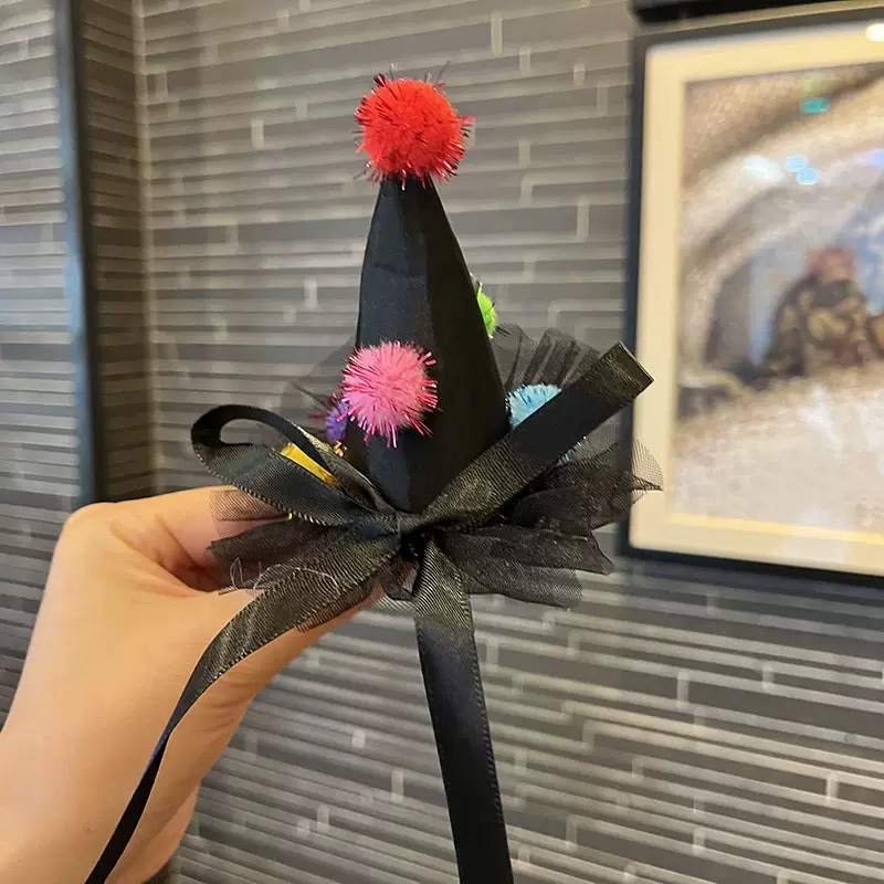 Kẹp mũ chóp nơ đen 1670