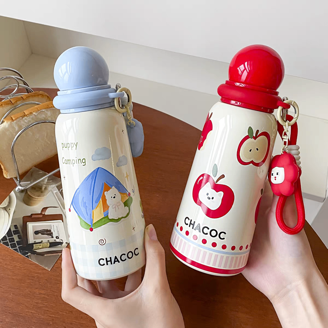Bình nước giữ nhiệt móc táo nắp tròn 316