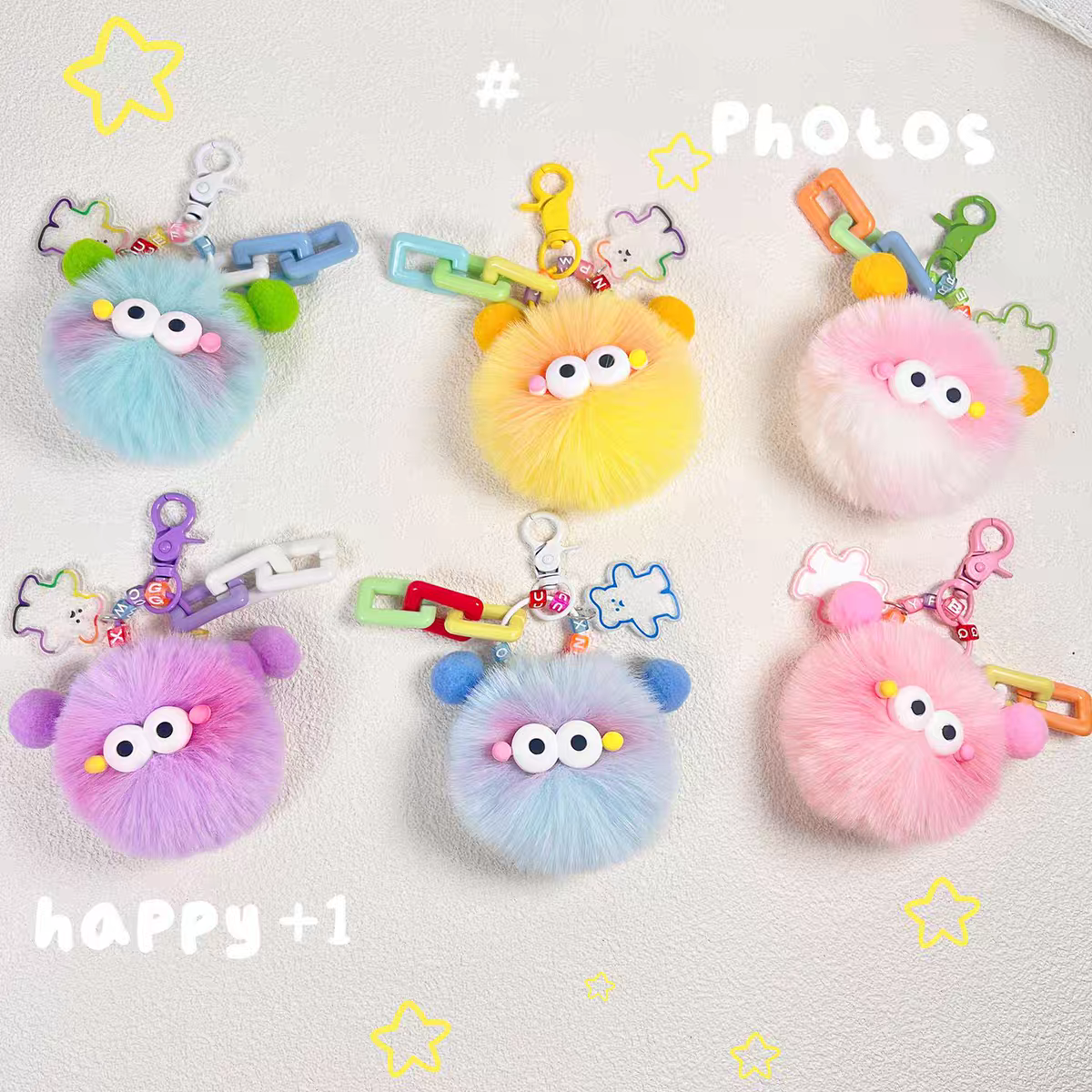 Móc khoá bông cục lông kèm charm 1019