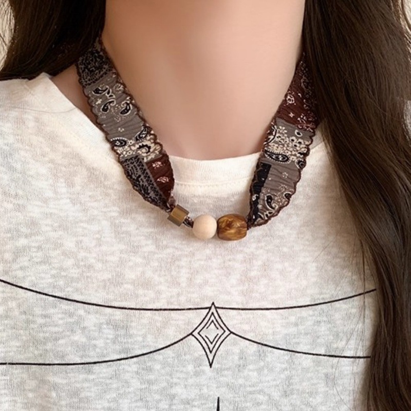 Vòng cổ khăn nhún hạt gỗ 910