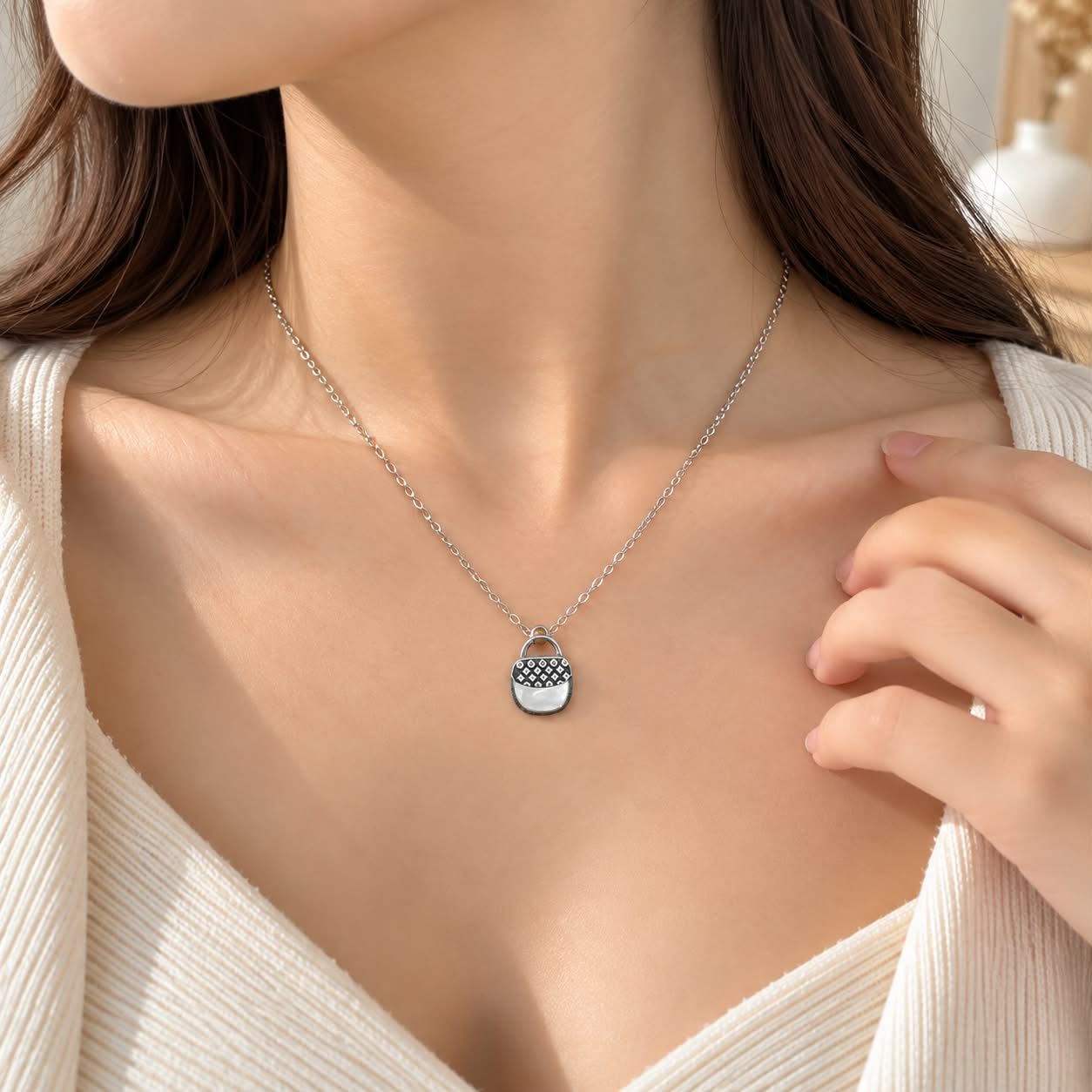 Vòng cổ titan túi xách 1050