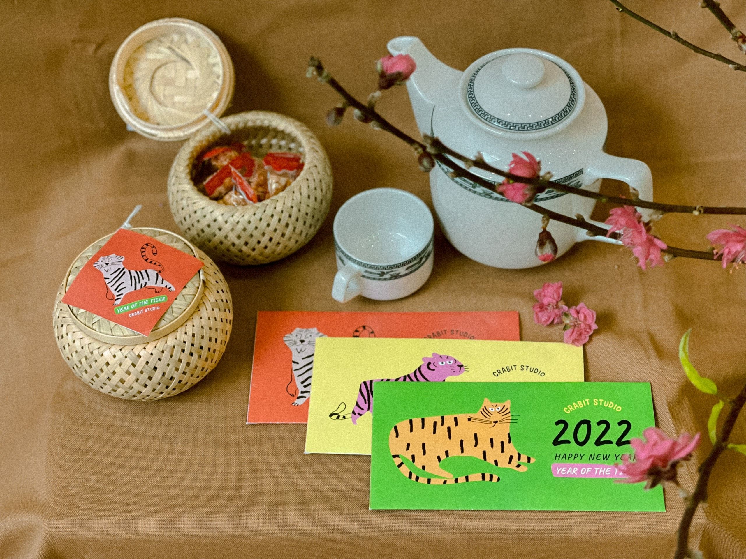May be an image of text that says 'GRABIT STUDIO CRABIT STUDIO 2022 HAPPY NEW YEAR OF THE'