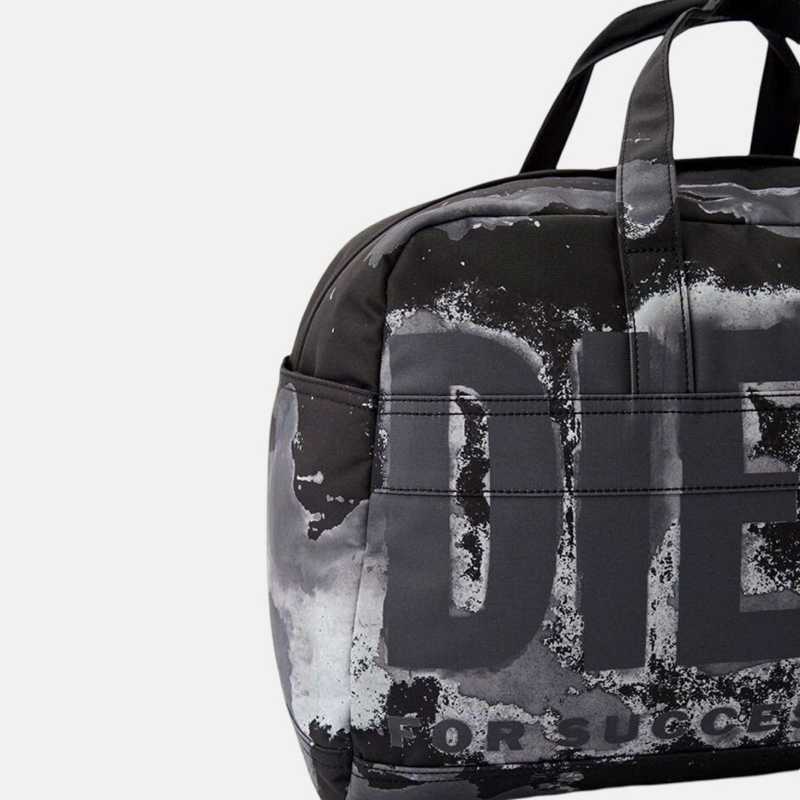 TÚI TRỐNG DIESEL CHỮ ĐEN X09859P6338HA351