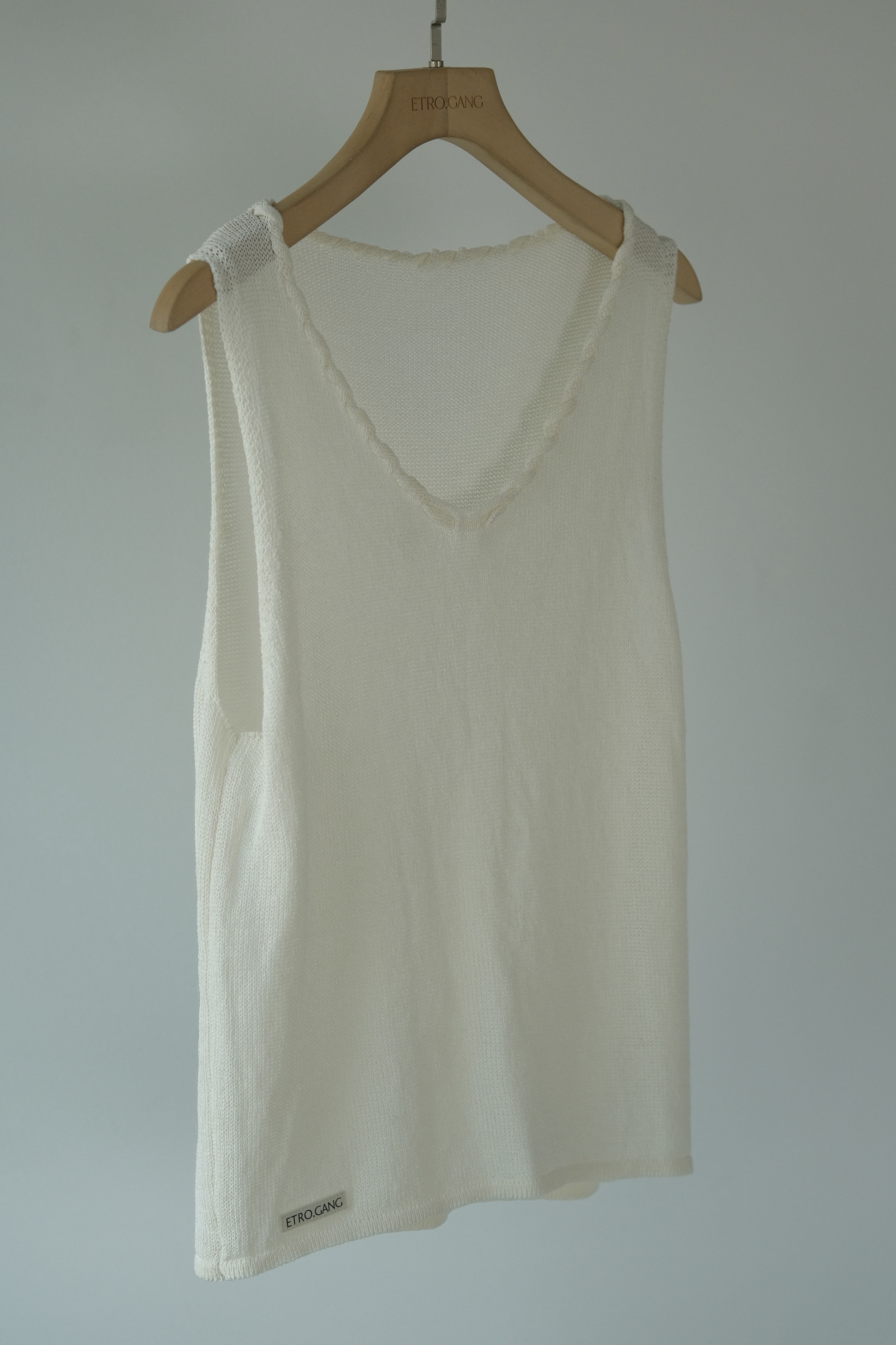 Ameri Tank Top (61099030_Áo ba lỗ nữ cổ V phối dây xoắn, đính tag EG, từ vải dệt kim)